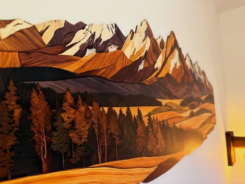 Wooden wall picture of the Tatra peaks above the bed